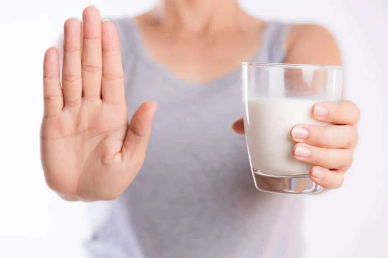 Woman Holding A Glass of Milk 