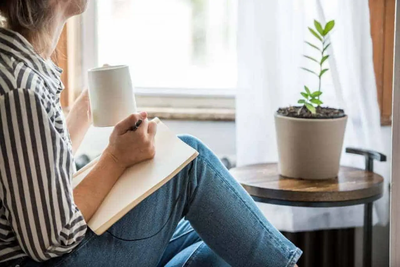 Woman Writing on Her Journal 
